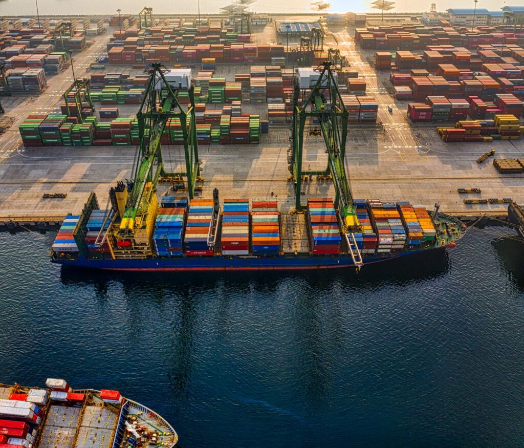 pexels photo 3856433 Aerial shot of colorful shipping containers at North Jakarta's bustling port, Indonesia.